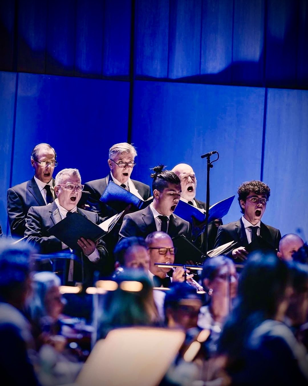 Performing on stage with a choir